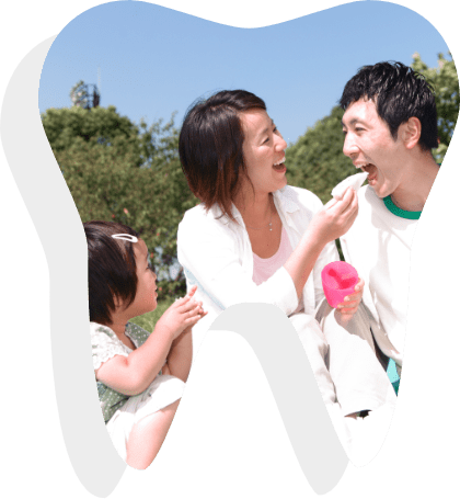 Family enjoy outfoor picnic after the man had root canal treatment