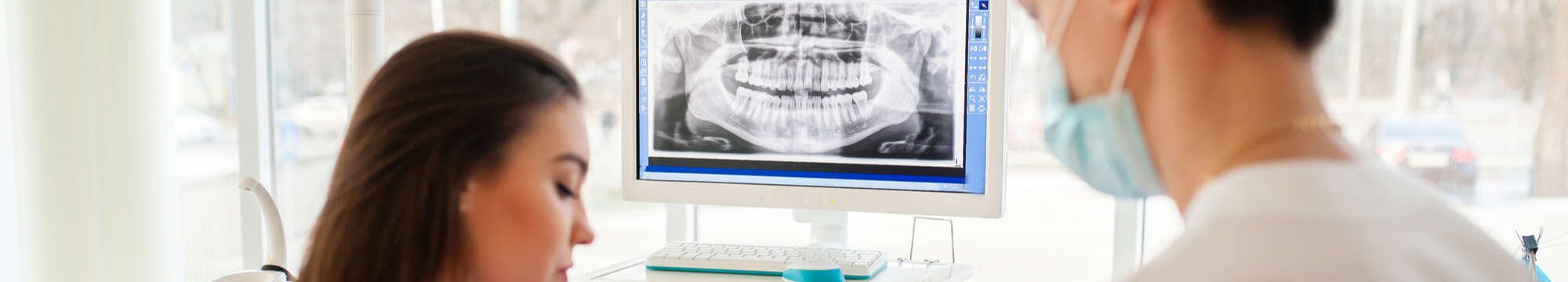 dentists analysing xray