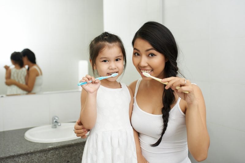 how to make your teeth naturally by practising proper oral hygiene 