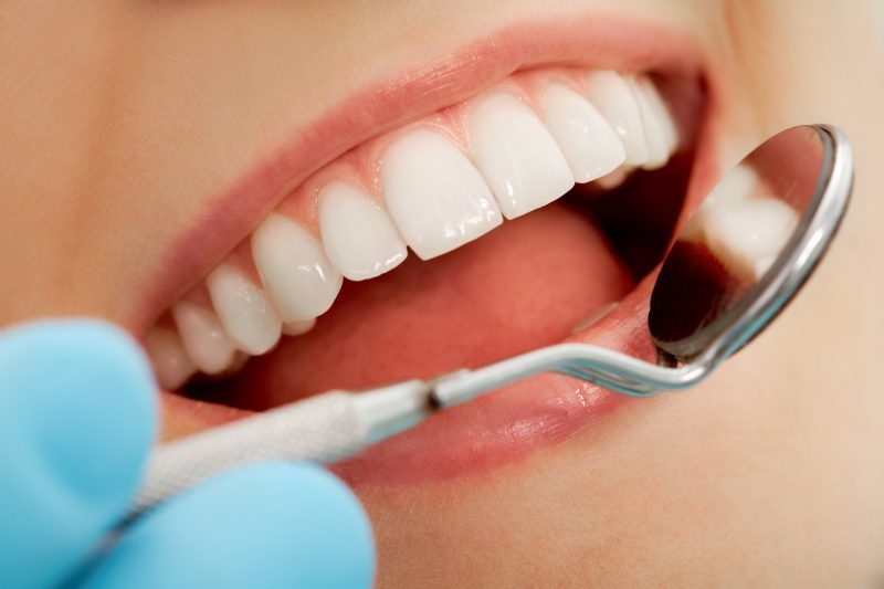 regular dental check up is a way to adopt good oral hygiene habits