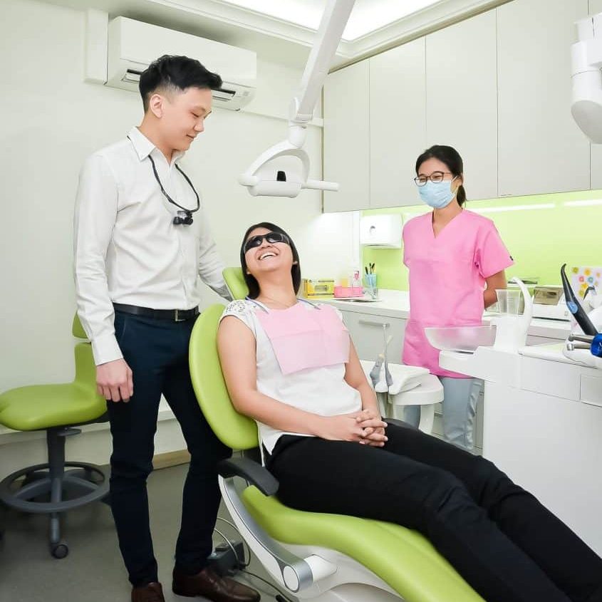 Patient check-up with Dr Russell and dental nurse Patient check-up with Dr Russell and dental nurse